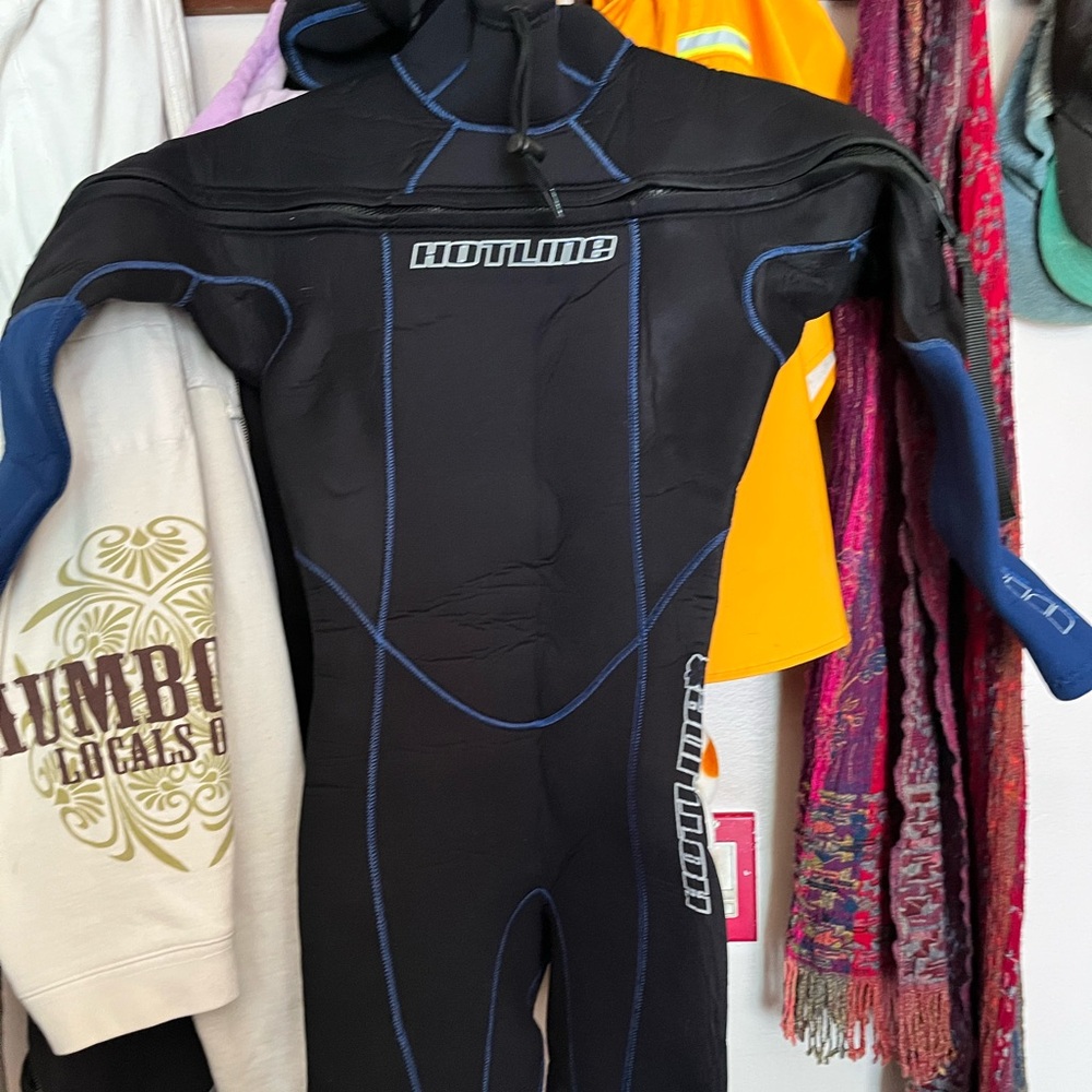 Hotline Women’s 5 mm, size 8, wetsuit, with size 7 botties.